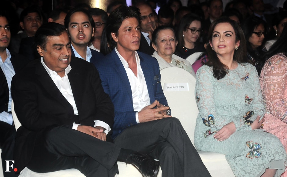 Mukesh Ambani, chairman and MD of Reliance Industries, is seen sitting in the front row at the event along with Shah Rukh Khan and Nita Ambani. The book's section titled Mukesh Ambani, chairman and MD of Reliance Industries, is seen sitting in the front row at the event along with Shah Rukh Khan and Nita Ambani. The book's section titled