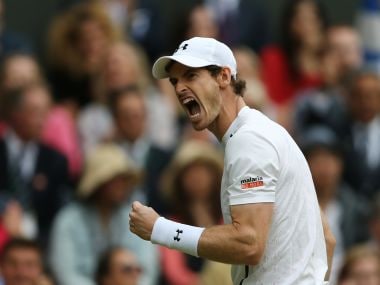 Andy Murray celebrates winning against Jo-Wilfried Tsonga at Wimbledon. AFP
