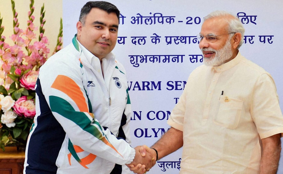 PM Modi greeted each member of 103-strong contingent during the send-off ceremony. Modi shook hands with shooter Gagan Narang. Photo: PTI PM Modi greeted each member of 103-strong contingent during the send-off ceremony. Modi shook hands with shooter Gagan Narang. Photo: PTI
