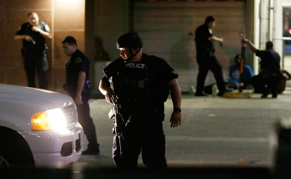 Police Chief David O Brown said police have a suspect cornered in a garage and are negotiating with that person. He says the snipers fired upon officers Police Chief David O Brown said police have a suspect cornered in a garage and are negotiating with that person. He says the snipers fired upon officers