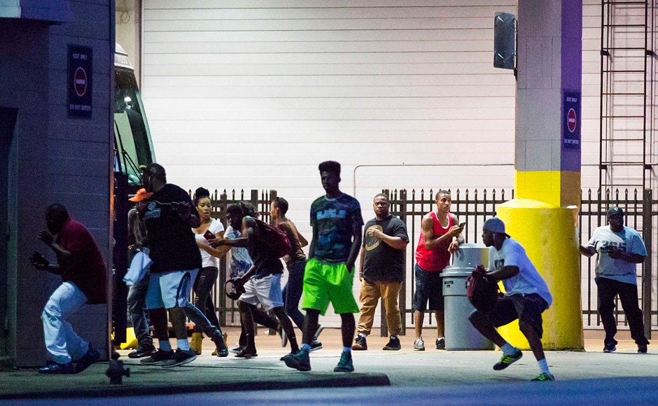 Bystanders run for cover after shots fired at a Black Live Matter rally in downtown Dallas. The Dallas Morning News Bystanders run for cover after shots fired at a Black Live Matter rally in downtown Dallas. The Dallas Morning News