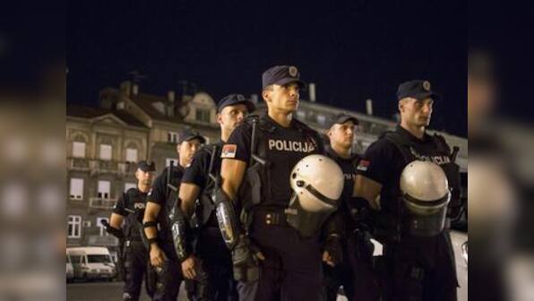 Man kills wife and opens fire in Serbian cafe, leaving 5 dead and 20 injured