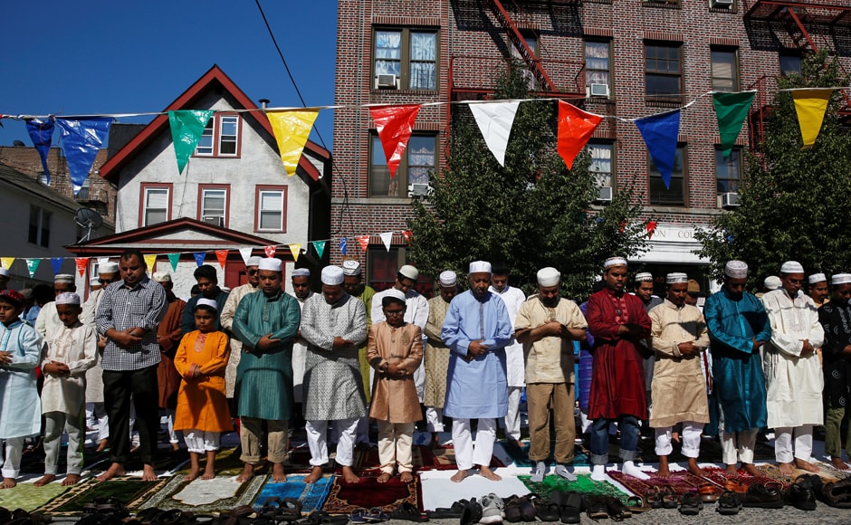 Muslim men attend Eid al-Fitr prayers to mark the end of the holy fasting month of Ramadan in the Queens borough of New York. Reuters Muslim men attend Eid al-Fitr prayers to mark the end of the holy fasting month of Ramadan in the Queens borough of New York. Reuters