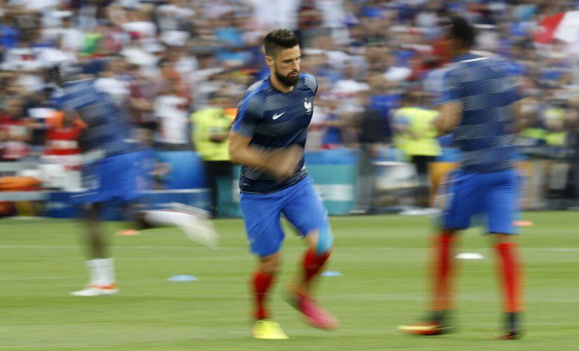 Olivier Giroud warms up. Reuters