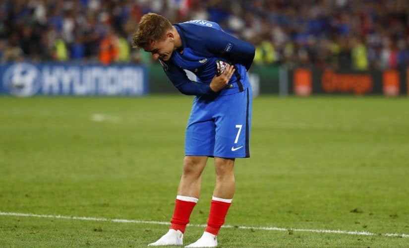 Antoine Griezmann acknowledges fans as he celebrates at the end of match against Germany. Reuters