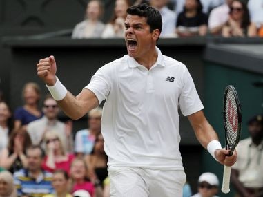 Milos Raonic celebrates winning against Roger Federer in the Wimbledon semi-final. AP