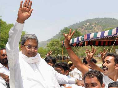 Siddaramaiah finds himself in spot of bother after IAS officer slaps case on his loyalist Siddaramaiah finds himself in spot of bother after IAS officer slaps case on his loyalist