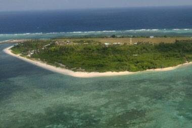 An aerial photo shows Thitu Island, part of the disputed Spratly group of islands, in the South China Sea. AFP