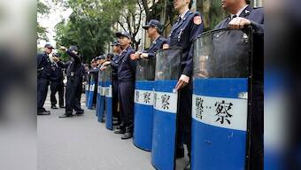 Taiwan police locks down suspect after train blast in Taipei