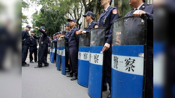 Taiwan police locks down suspect after train blast in Taipei