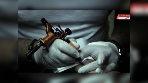 For this Bethlehem tattoo artist, religion is more than skin deep