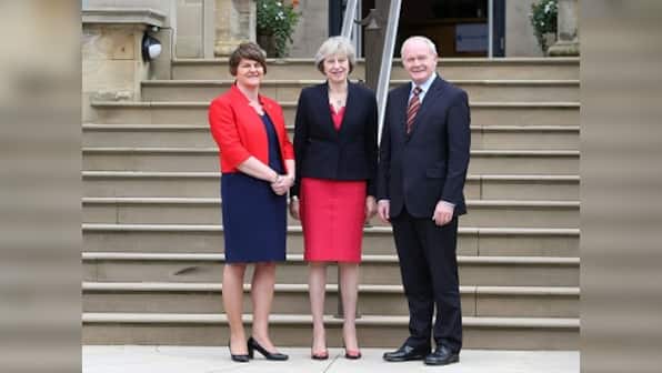 UK PM Theresa May visits Northern Ireland to allay Brexit concerns