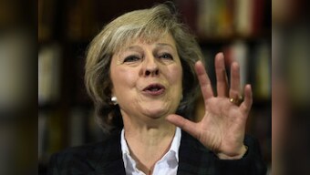 UK PM May lets go of Britain's European Council presidency ahead of Merkel talks