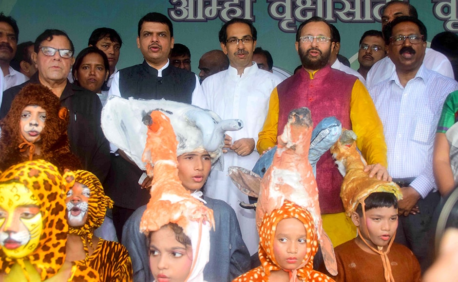 Maharashtra Chief Minister Devendra Fadnavis, Shiv Sena chief Uddhav Thackeray and Prakash Javadekar, Union Minister of State for Environment, Forests and Climate Change, during a tree plantation drive at Maharashtra Nature Park, in Mumbai, India on July 1, 2016. (Sanket Shinde/ SOLARIS IMAGES)