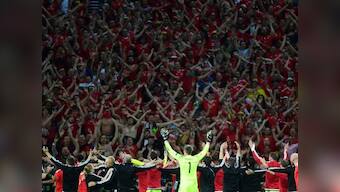 Gareth Bale-led Wales return to hero's welcome as 30,000 fans throng bus top parade