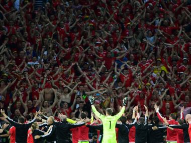 Gareth Bale-led Wales return to hero's welcome as 30,000 fans throng bus top parade Gareth Bale-led Wales return to hero's welcome as 30,000 fans throng bus top parade