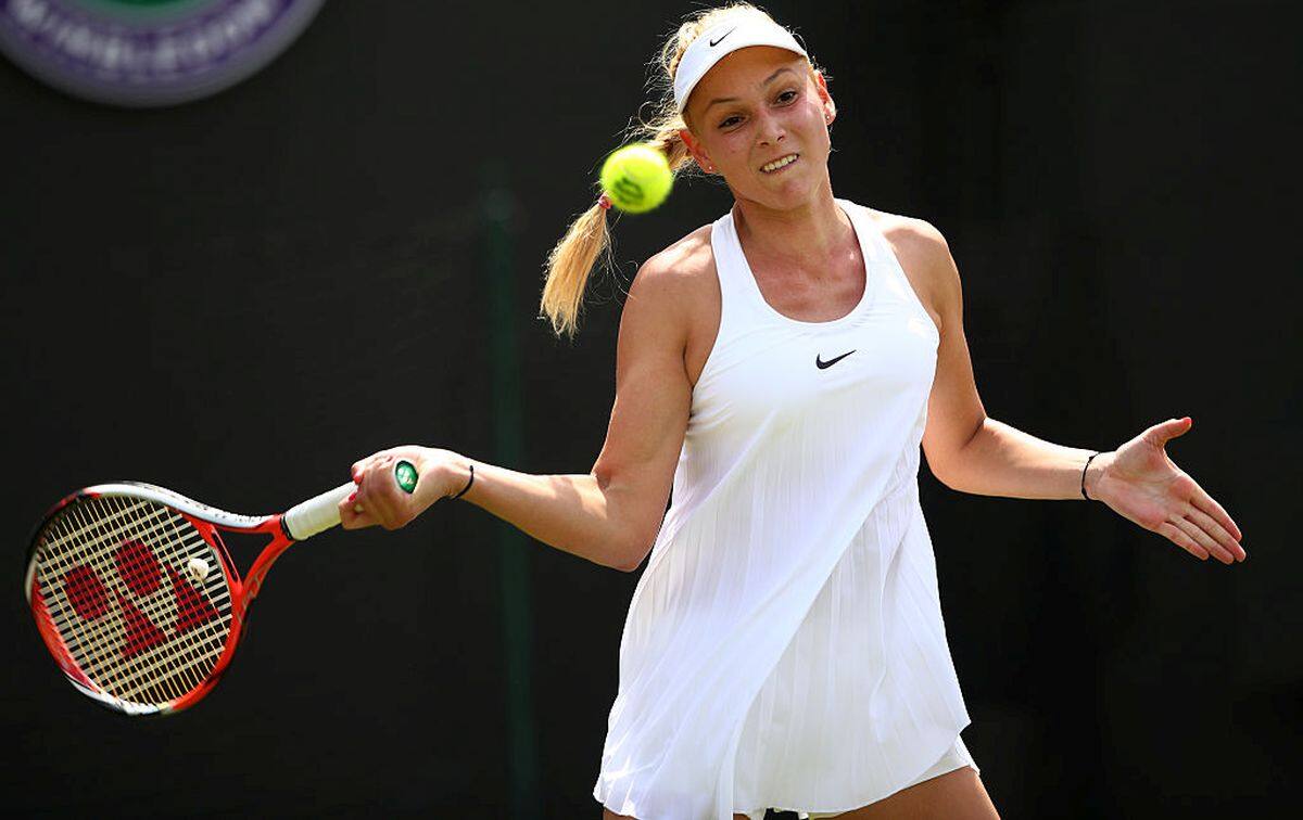 LONDON, ENGLAND - JUNE 27: Donna Vekic of Croatia plays a forehand shot during the Ladies Singles first round against Venus Williams of The United States on day one of the Wimbledon Lawn Tennis Championships at the All England Lawn Tennis and Croquet Club on June 27th, 2016 in London, England. (Photo by Clive Brunskill/Getty Images)