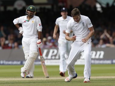 England's Chris Woakes celebrates taking a wicket on Day 3. AFP