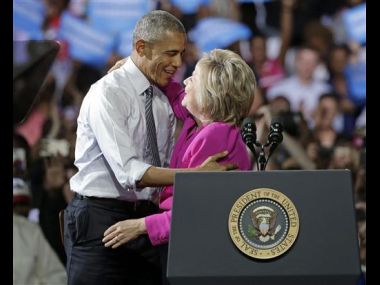 'Ready to pass the baton': Barack Obama campaigns with Hillary Clinton 'Ready to pass the baton': Barack Obama campaigns with Hillary Clinton