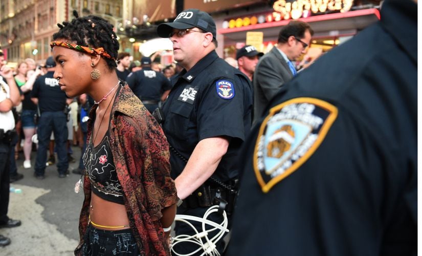 Demonstators are arrested by NYPD after they march through the city and call for justice for Alton Sterling and Philandro Castile in the middle of Times Square on Thursday. Reuters