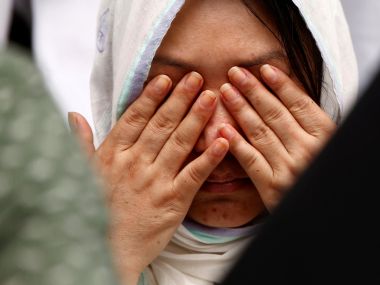 Family of those killed in Friday's attack in Bangladesh's Dhaka, mourn their death. Reuters
