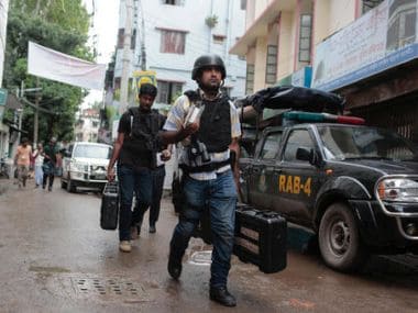 Cops after the raid in Dhaka in Tuesday. AP