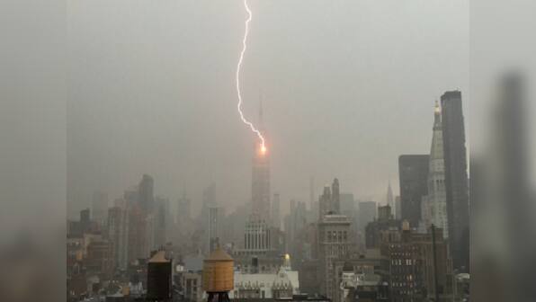 Lightening bolt strikes Empire State Building during a storm in New York