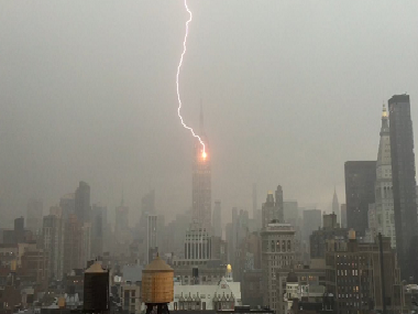 Lightening bolt strikes Empire State Building during a storm in New York Lightening bolt strikes Empire State Building during a storm in New York