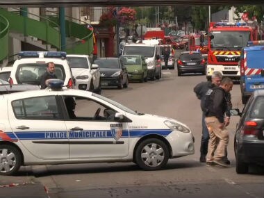 Police investigate the site of attack. AP