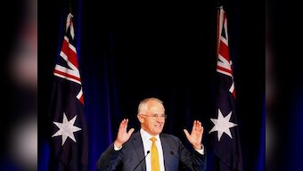 Turnbull to continue as Australian PM as debate rages over of voting