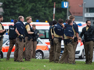 Police officials after the Munic attack. AP