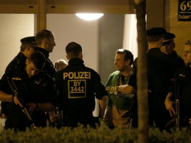 Police search for the suspect after Munich shooting rampage. Reuters