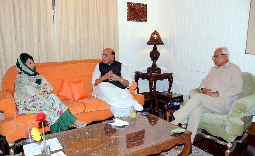 Union Home Minister Rajnath Singh with Governor of Jammu and Kashmir N N Vohra and Chief Minister Mehbooba Mufti during their meeting in Srinagar on Saturday. PTI