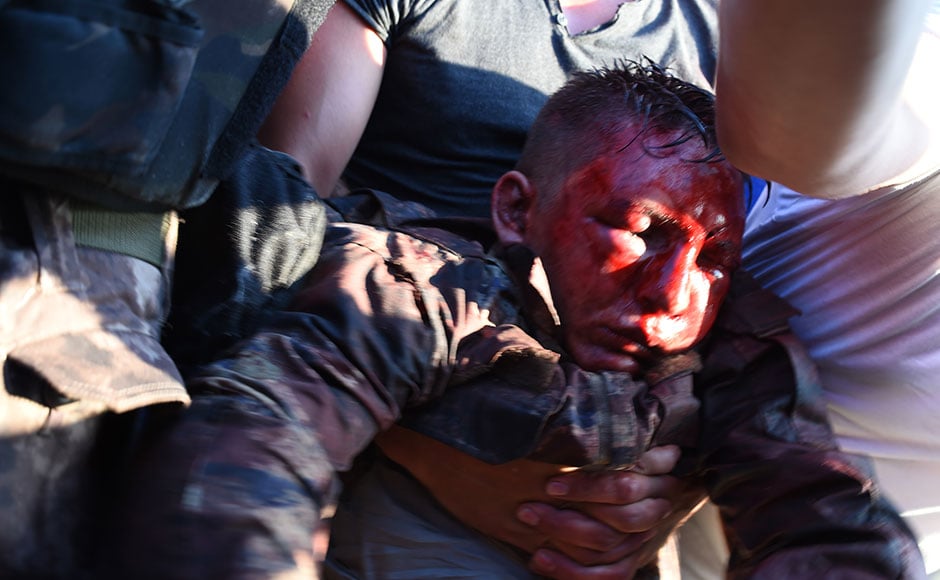 Erdogan on Saturday said that his government was working to crush a coup attempt after a night of explosions, air battles and gunfire across the capital that left around 260 dead and at least 150 people wounded. Photo: AFP Erdogan on Saturday said that his government was working to crush a coup attempt after a night of explosions, air battles and gunfire across the capital that left around 260 dead and at least 150 people wounded. Photo: AFP