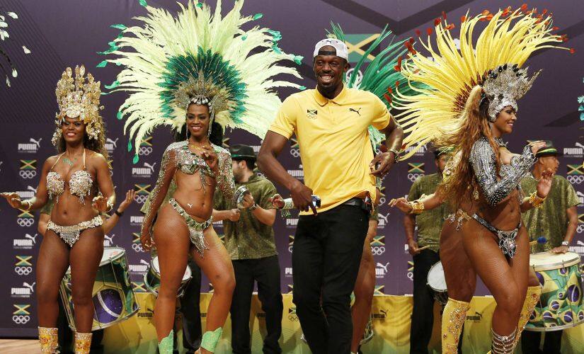 Usain Bolt dances samba during a Jamaican Olympic Association and Puma press conference. AFP
