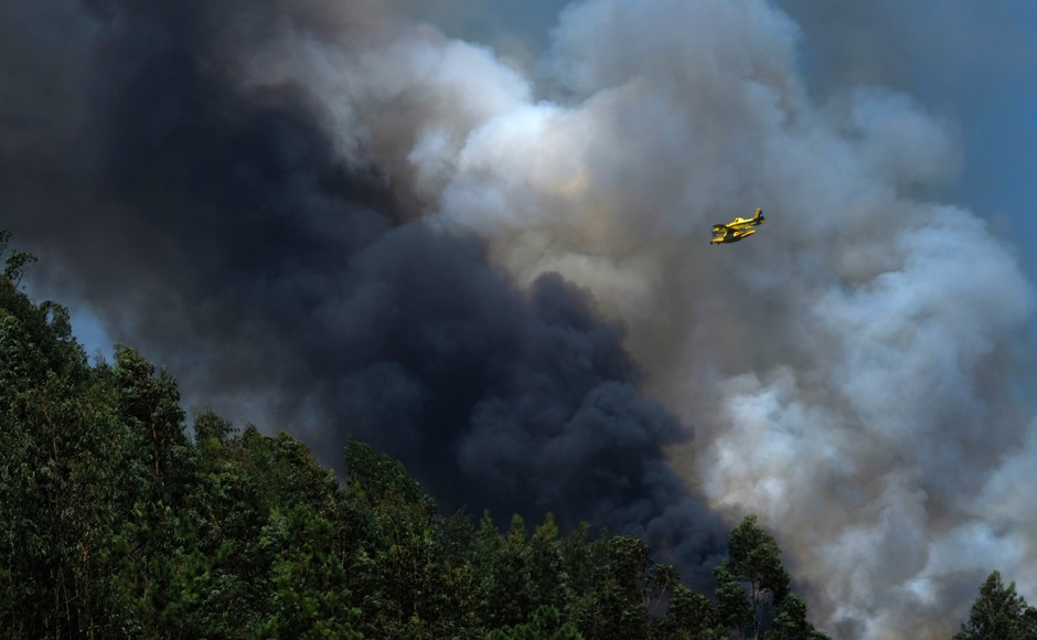 Firefighters battle multiple blazes as wildfires ravage Portugal