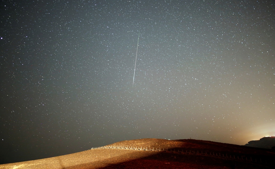 The Perseids happen when Earth hits a wide belt of debris left behind by the comet Tuttle-Swift on its elongated, 133-year orbit around the Sun. Reuters The Perseids happen when Earth hits a wide belt of debris left behind by the comet Tuttle-Swift on its elongated, 133-year orbit around the Sun. Reuters