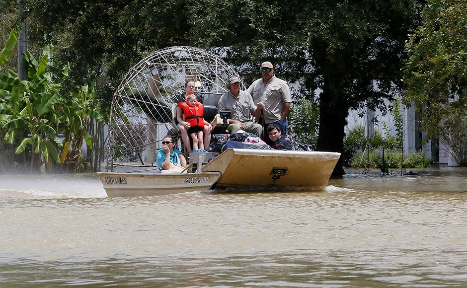 The Louisiana National Guard reported that its soldiers rescued nearly 500 people and 61 pets by boat, helicopter, and using high-water vehicles. Photo: Reuters The Louisiana National Guard reported that its soldiers rescued nearly 500 people and 61 pets by boat, helicopter, and using high-water vehicles. Photo: Reuters