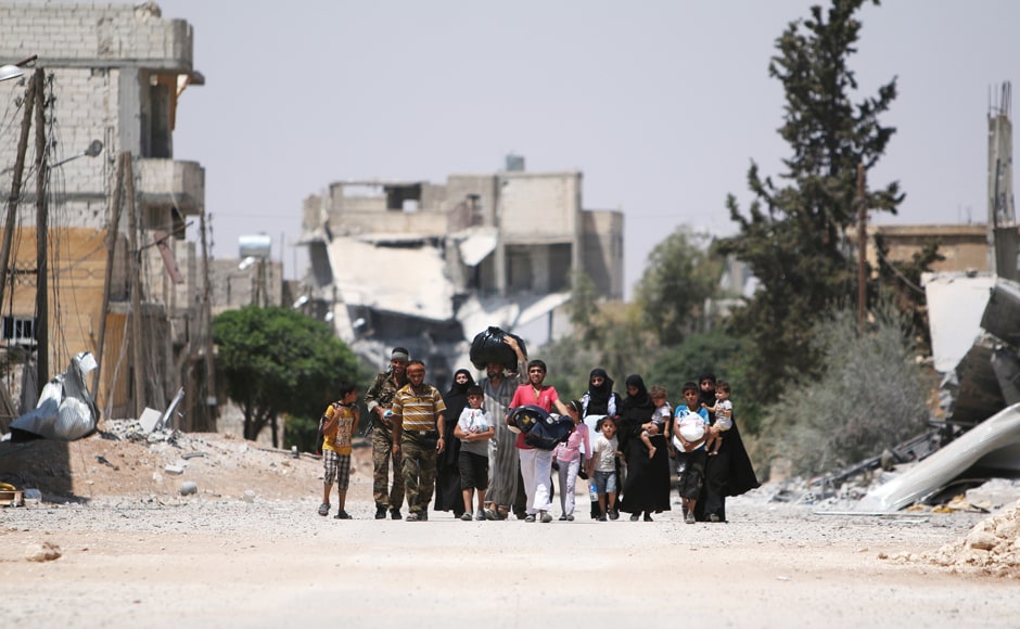 Syrians return to Manbij as security forces drive Islamic State out of ...