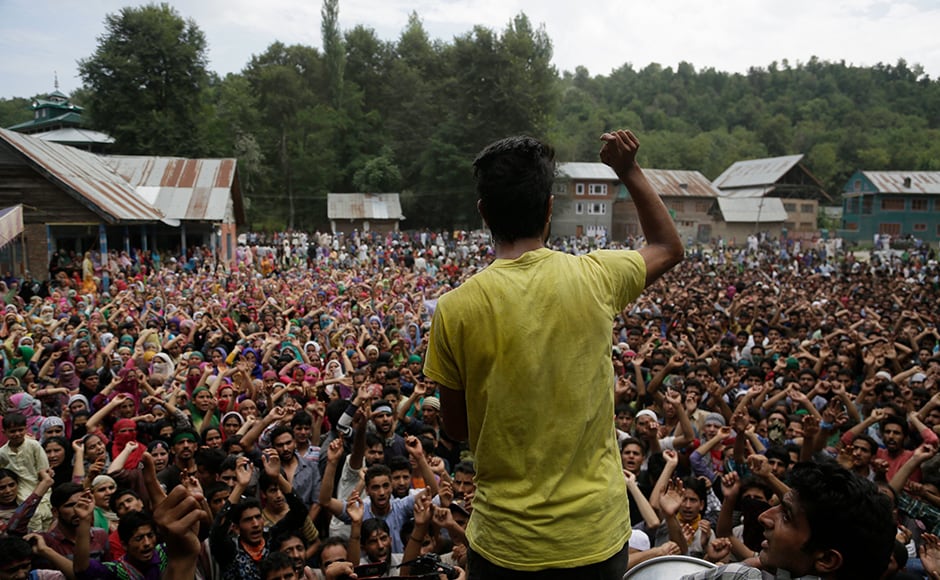 Kashmiris shout pro-freedom slogans during the joint funeral at Aripanthan village in Srinagar. AP Kashmiris shout pro-freedom slogans during the joint funeral at Aripanthan village in Srinagar. AP