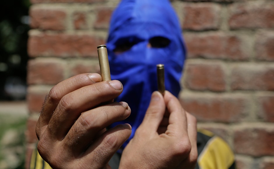 A masked Kashmiri youth shows empty bullet cartridges allegedly fired by government forces at the four civilians at Aripanthan village in Srinagar. More than 7,000 civilians have also been injured in action by government forces hundreds of them have lost eyesight and others maimed for life due to firearm injuries. AP A masked Kashmiri youth shows empty bullet cartridges allegedly fired by government forces at the four civilians at Aripanthan village in Srinagar. More than 7,000 civilians have also been injured in action by government forces hundreds of them have lost eyesight and others maimed for life due to firearm injuries. AP