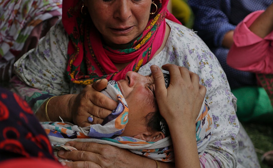 Two more civilians, on Tuesday, were killed in central Kashmir's Budgam district when CRPF personnel opened fire on a group of protesters in Aripanthan area of Beerwah. An unidentified family member of a killed civilian cries during a joint funeral of the slain four civilians. AP Two more civilians, on Tuesday, were killed in central Kashmir's Budgam district when CRPF personnel opened fire on a group of protesters in Aripanthan area of Beerwah. An unidentified family member of a killed civilian cries during a joint funeral of the slain four civilians. AP