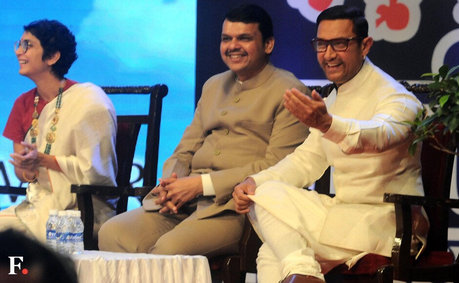 CM Devendra Fadnavis and Aamir Khan share a moment. The event was held at YB Chavan Auditorium, Mumbai. Sachin Gokhale/Firstpost CM Devendra Fadnavis and Aamir Khan share a moment. The event was held at YB Chavan Auditorium, Mumbai. Sachin Gokhale/Firstpost