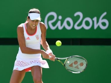 Ana Ivanovic in action against Carla Suarez in Rio. AFP