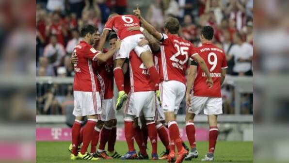 European football roundup: Manchester United, City, shine; Bayern score six; PSG suffers shock loss