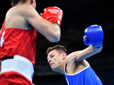 Carmine Tommassone became the first pro boxer to win an Olympic bout. AFP