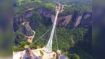 Dare to look down: China launches world's longest and highest glass-bottomed bridge