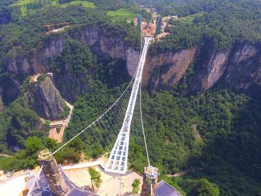 Dare to look down: China launches world's longest and highest glass-bottomed bridge Dare to look down: China launches world's longest and highest glass-bottomed bridge
