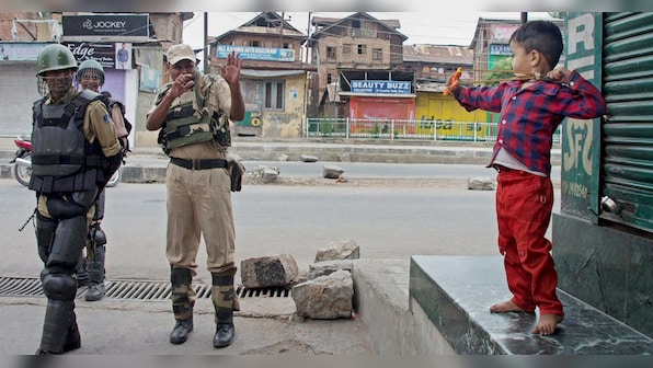Have we failed Kashmir? Twitter reacts to photo of boy aiming slingshot at police