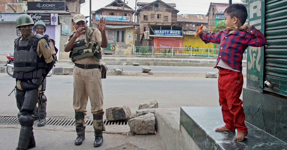 Have we failed Kashmir? Twitter reacts to photo of boy aiming slingshot at police Have we failed Kashmir? Twitter reacts to photo of boy aiming slingshot at police